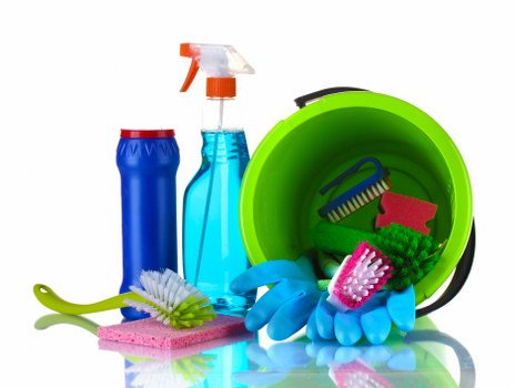 Technician preparing carpet cleaning equipment in a safe indoor workspace